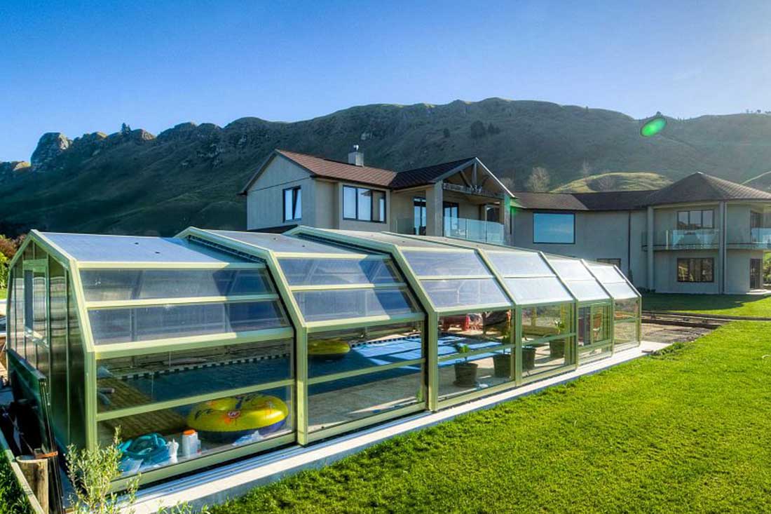 Glass retractable roof